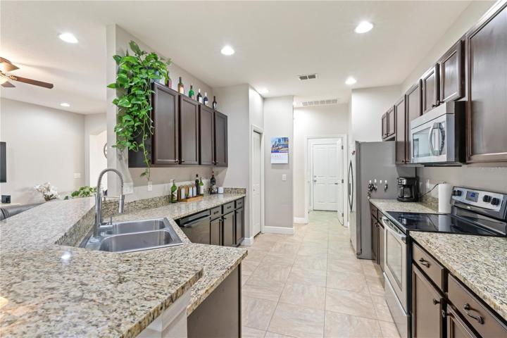 Large Spacious Kitchen with oversized wood cabinets