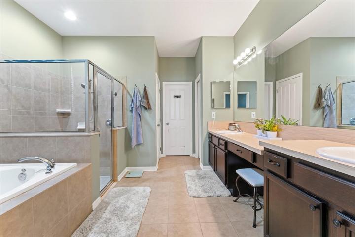 Separate soaking tub and walk in shower