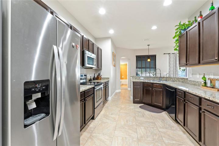Large Spacious Kitchen with oversized wood cabinets