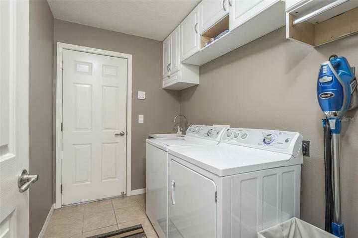 Laundry Room With Storage & Laundry Sink