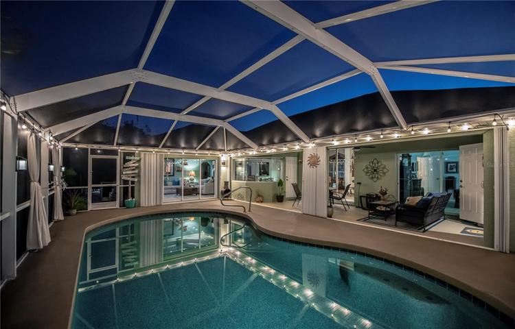 Pool has solar lit ambience and accent lights