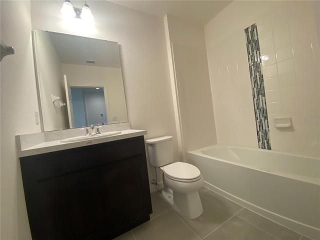 Third Bathroom Vanity and Toilet