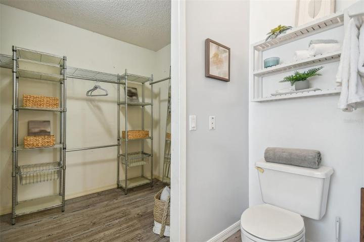 Large walk in closet in primary owners bedroom