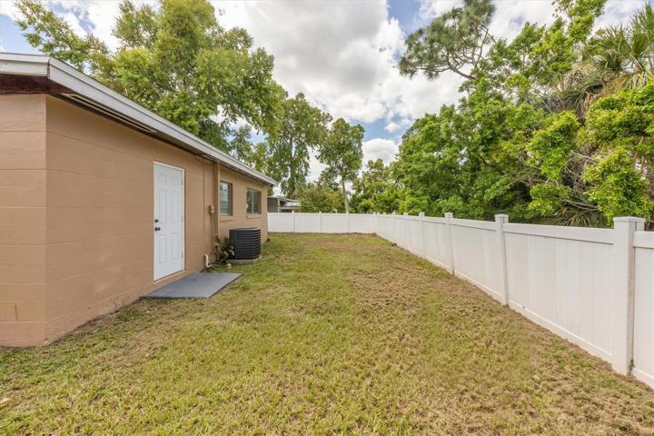 BACKYARD, DOOR IS TO LAUNDRY/UTLITY ROOM