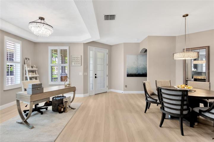 View of Front Door/Foyer, Bonus Area & Dining Room