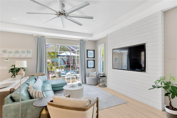Living Room with Glass Sliders to Screened Lanai
