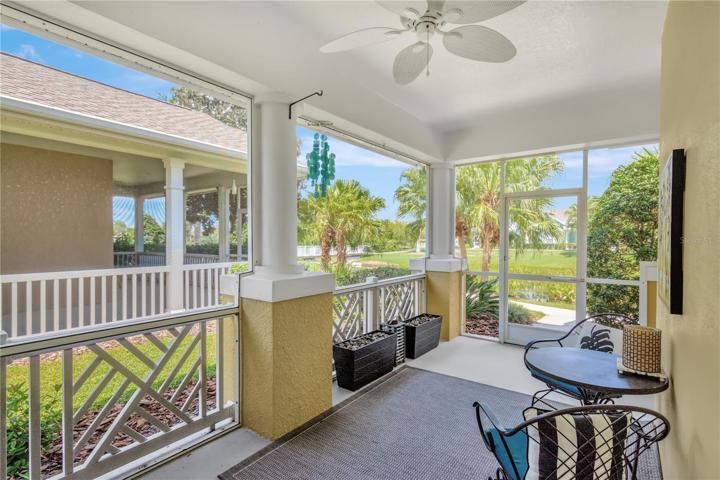 Front Screened & Covered Patio with Pond Views
