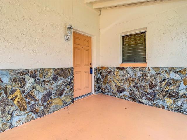 car port and entry door