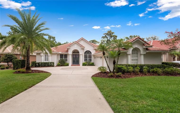 Prime lot backing onto conservation in the guard gated Alaqua lakes golf and tennis community.
