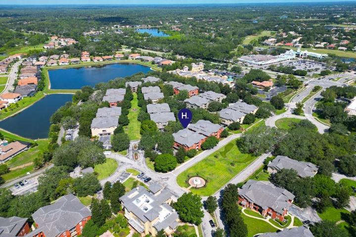 Aerial view of unit #129 located within walking distance to the community pool!