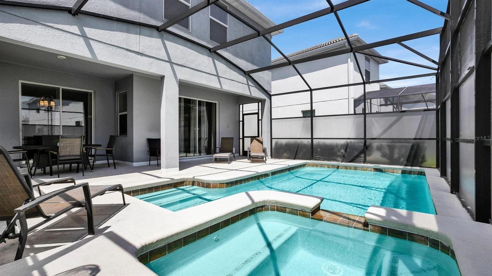 This beautiful POOL HOME comes FULLY FURNISHED, delivers TWO EN-SUITE BEDROOMS, a BONUS/LOFT and an array of FANTASTIC AMENITIES!