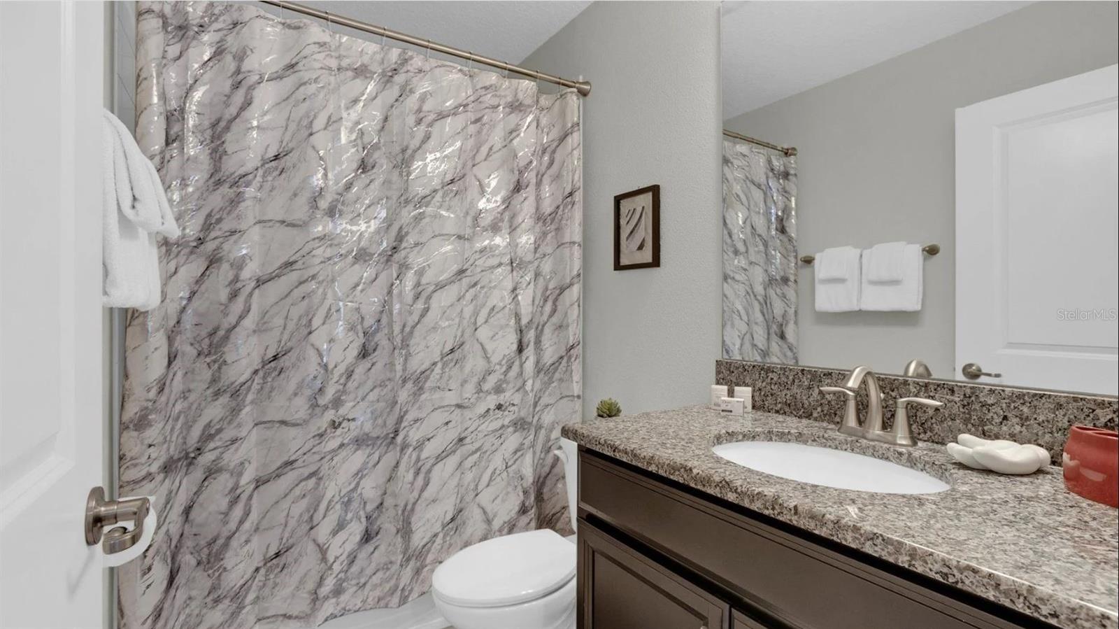 FULL GUEST BATH.