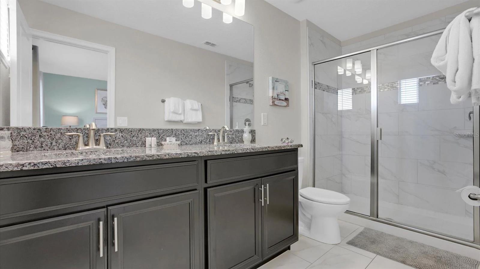 SECOND EN-SUITE BATH.