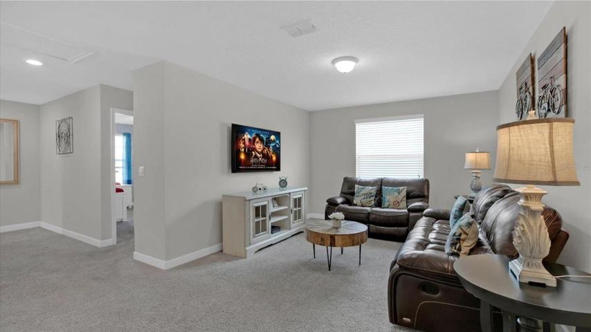 Head upstairs to check out the comfortable loft, perfect for hanging out after a long day or a night of movies and games!