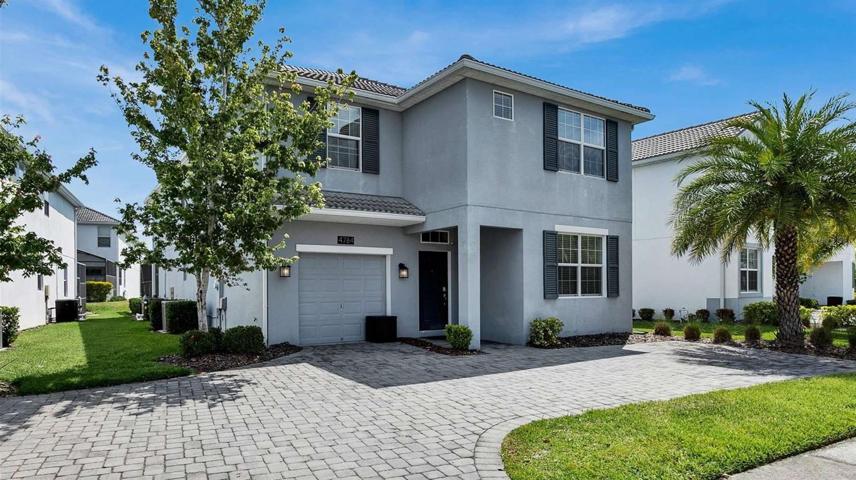 **TURN-KEY INVESTMENT PROPERTY/SHORT TERM RENTAL/ VACATION HOME** in the premier resort style gated community of Storey Lake in the heart of Kissimmee!