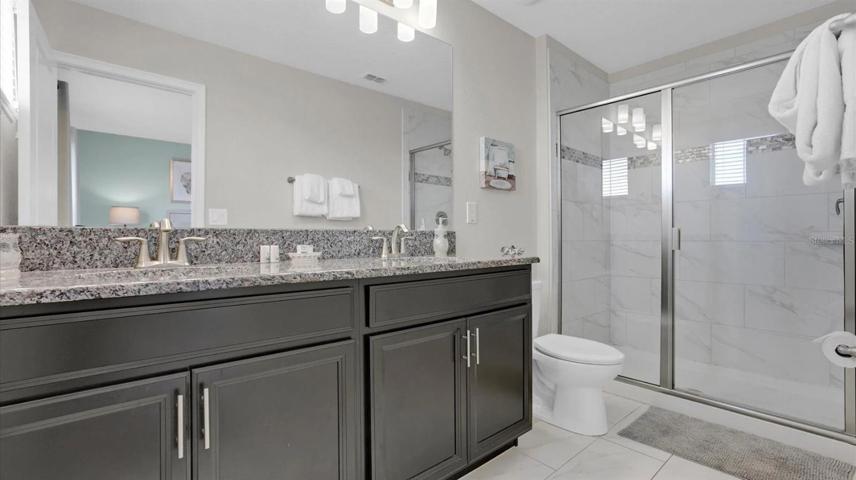 SECOND EN-SUITE BATH.
