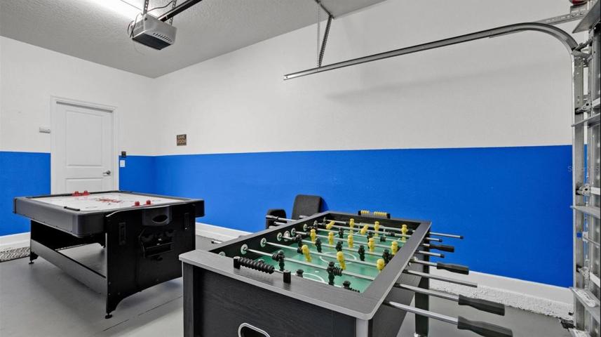 Game room is set up in the garage!