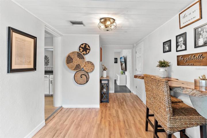 Foyer leading to Living and Kitchen Area