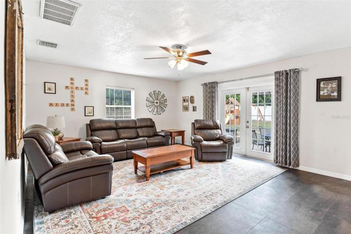 Living Area with French Doors to Patio Area