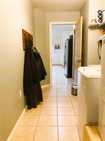 INSIDE GARAGE THRU LAUNDRY TO KITCHEN