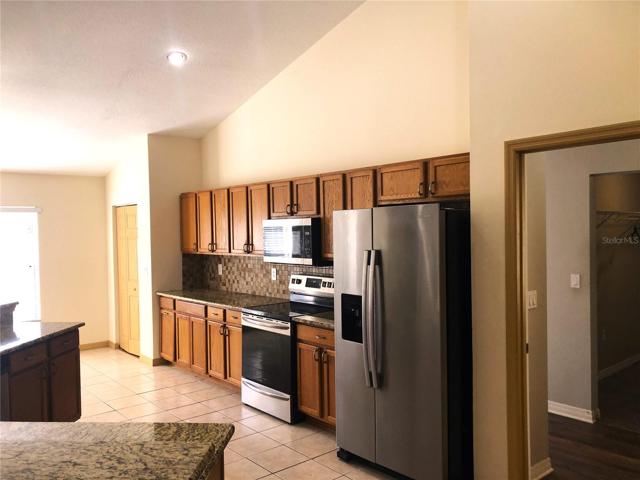 KITCHEN TO PROMARY ROOM DOOR
