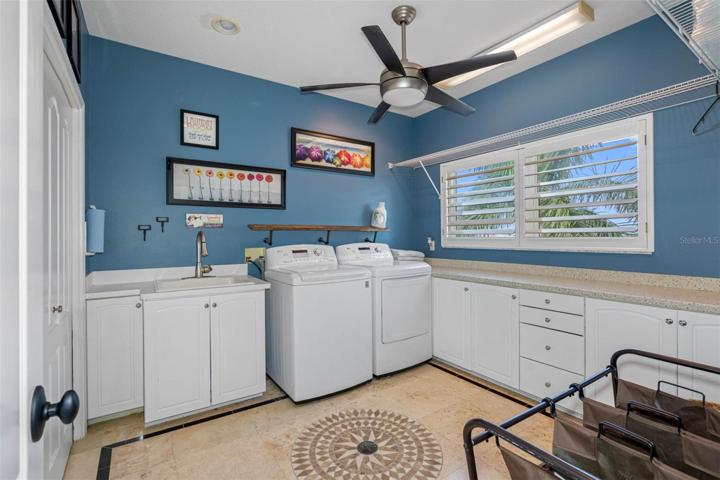 Laundry room with lots of storage space.