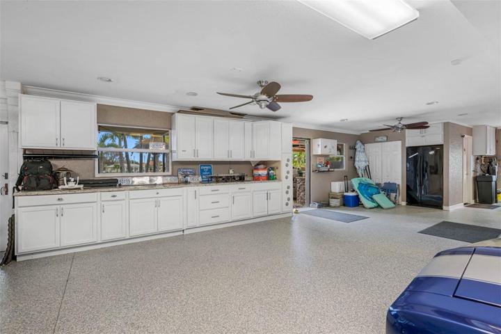 5-car garage with polyaspartic flooring.