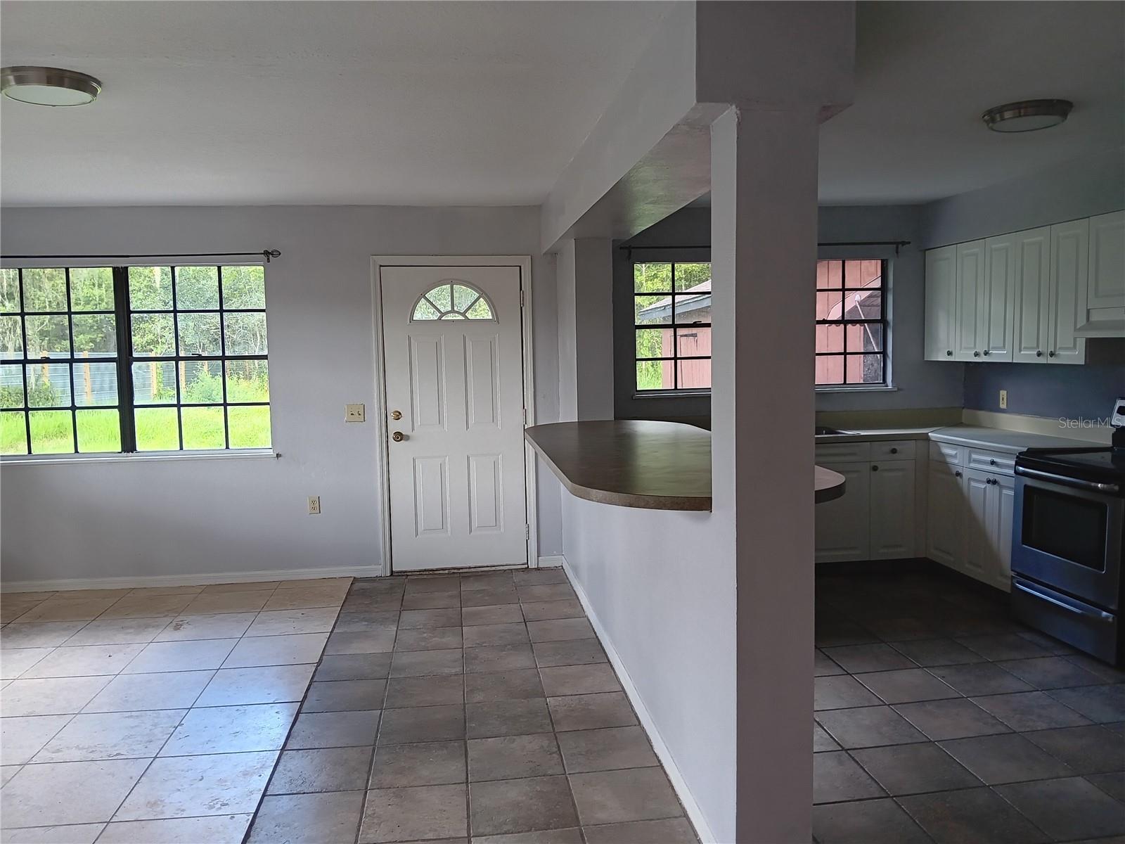 kitchen, breakfast bar and family room