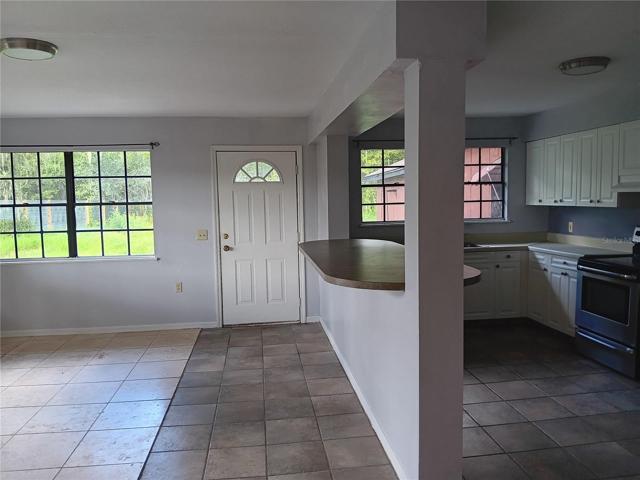 kitchen, breakfast bar and family room