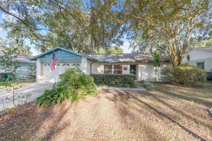 Spacious front yard and driveway for ample parking