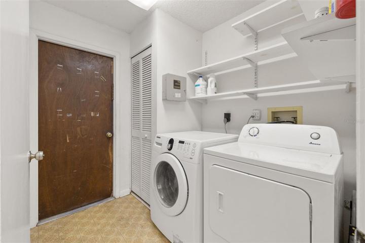 Full laundry room with extra storage potential