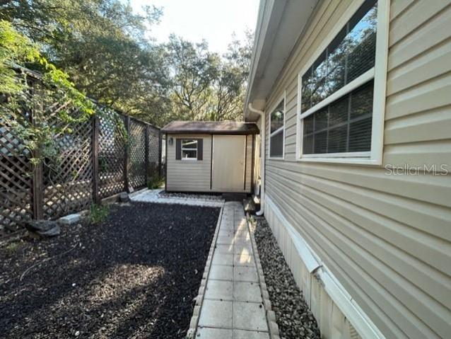 View from Carport to large shed