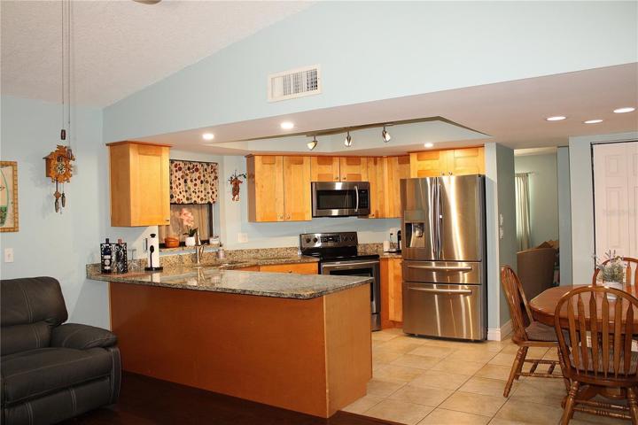 Kitchen with eat in area and famly room