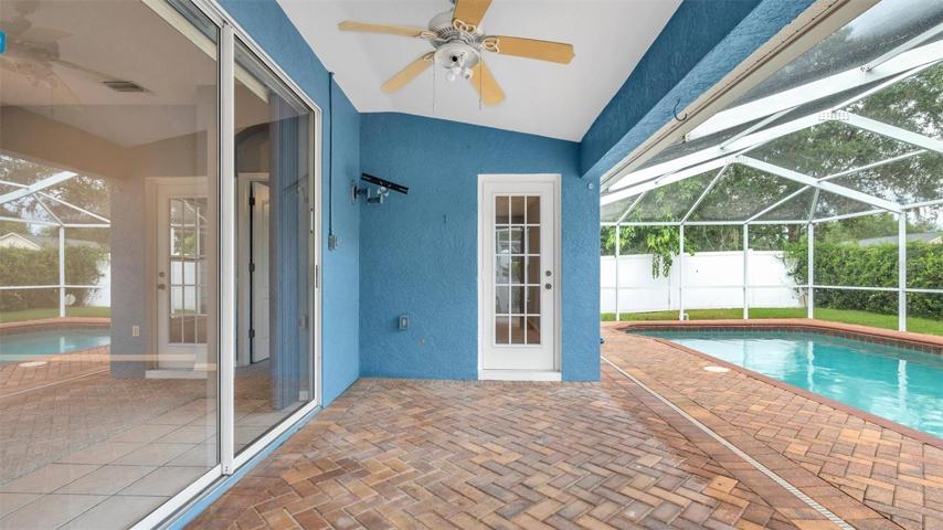 Back porch leading to pool