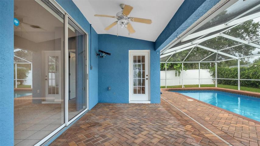 Back porch leading to pool
