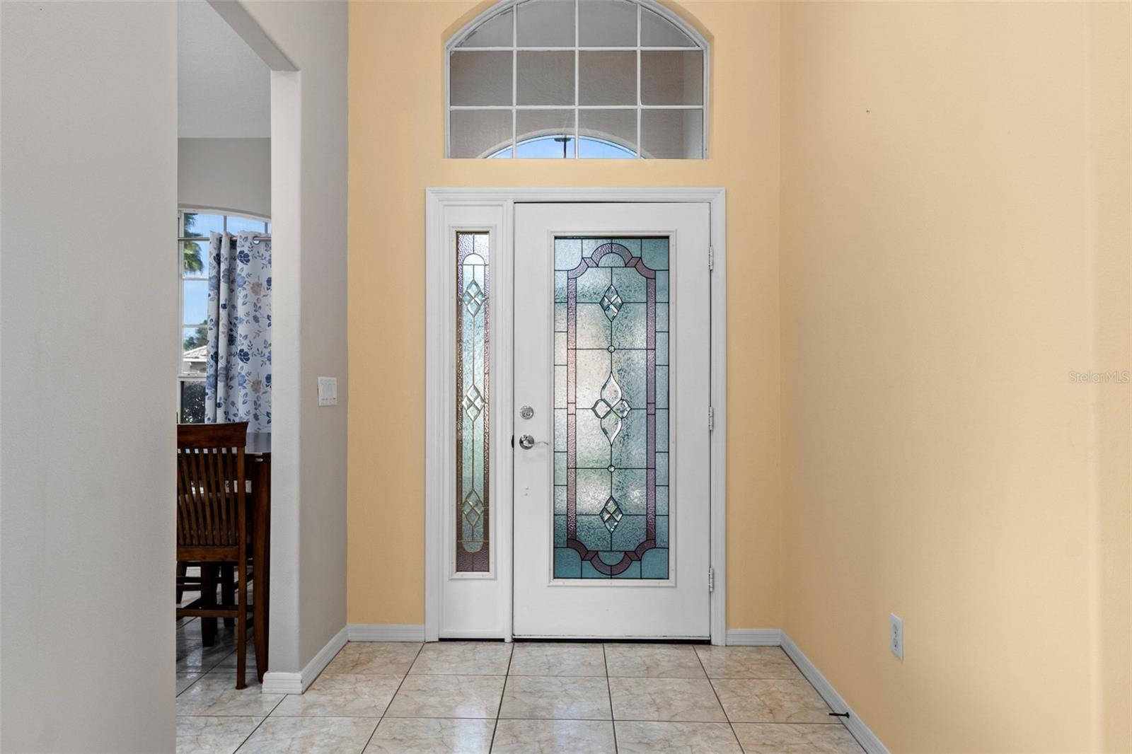 Inside the front entry. The kitchen is in the front of the house, on the left in this picture.  Behind the photographer is the rest of the house.