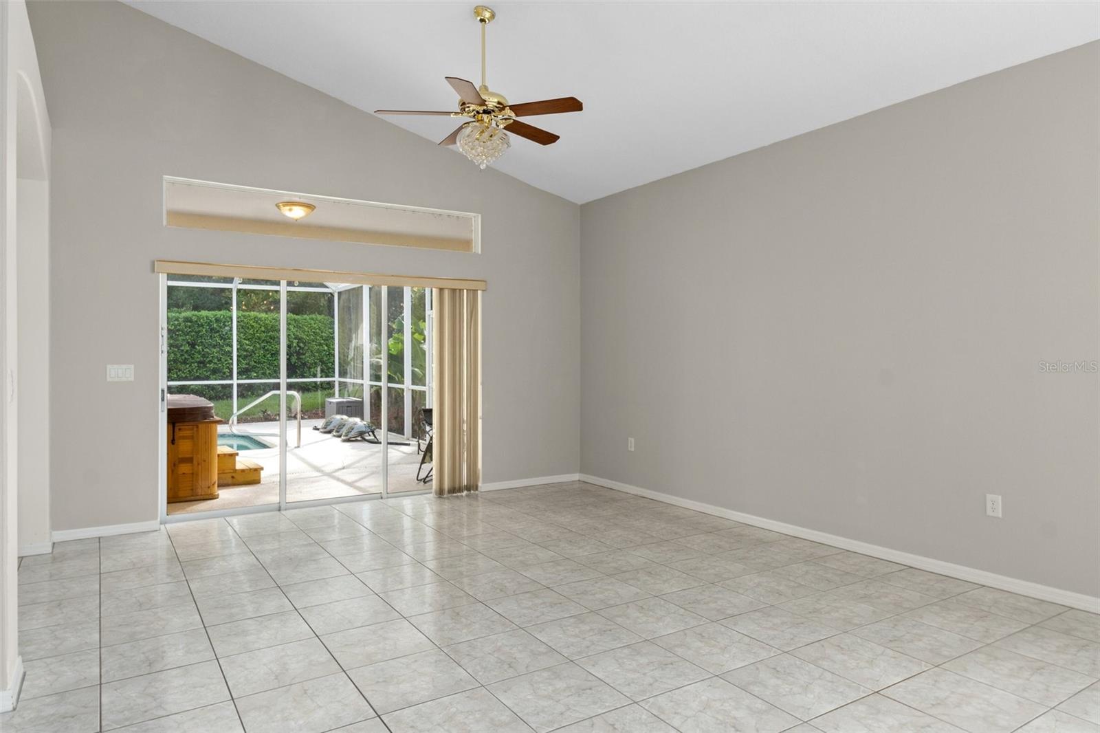 The entire living area has ceramic tile flooring for easy care. The sliding doors pocket out of site on the exterior, opening up to the lanai and expanding your living area.
