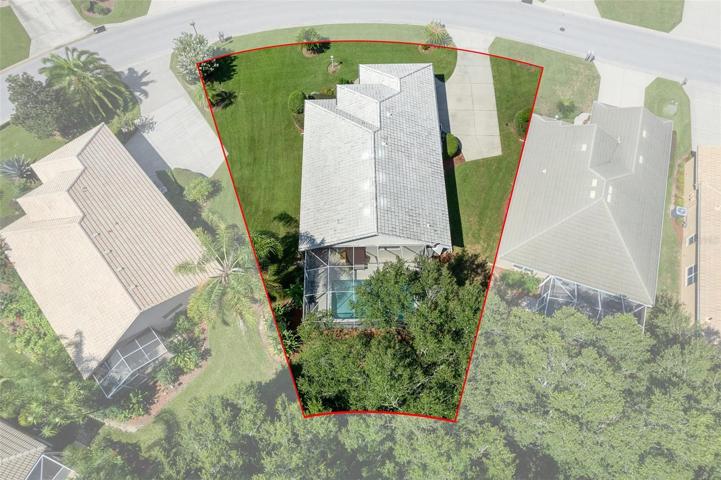 Aerial view of this oversized lot with mature trees in the back that help provide privacy.