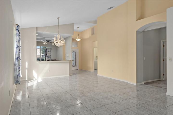 The view looking from the sliding doors back to the kitchen and front of the house.