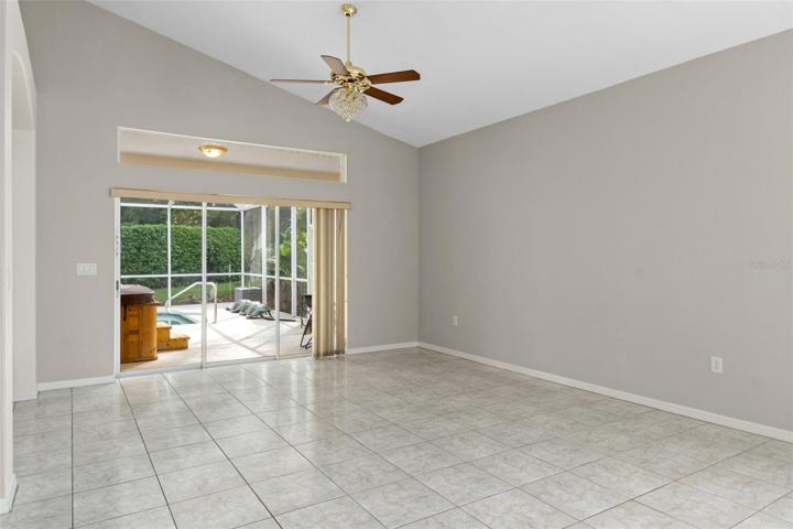 The entire living area has ceramic tile flooring for easy care. The sliding doors pocket out of site on the exterior, opening up to the lanai and expanding your living area.
