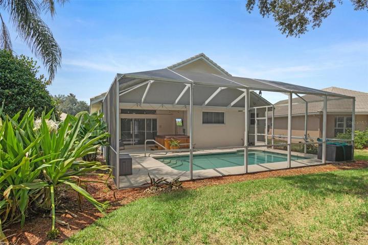 The backyard features some nice landscaping and larger trees that provide some privacy.