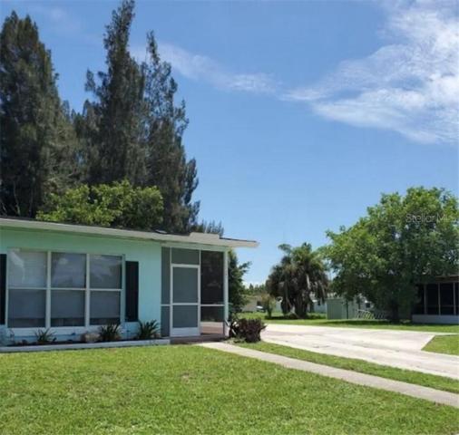 Front of the home facing West with extra parking pad.