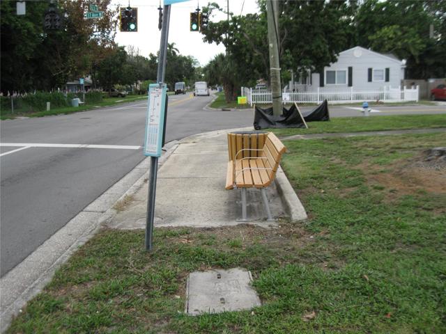 BUS STOP DIRECTLY IN FRONT OF DUPLEX.