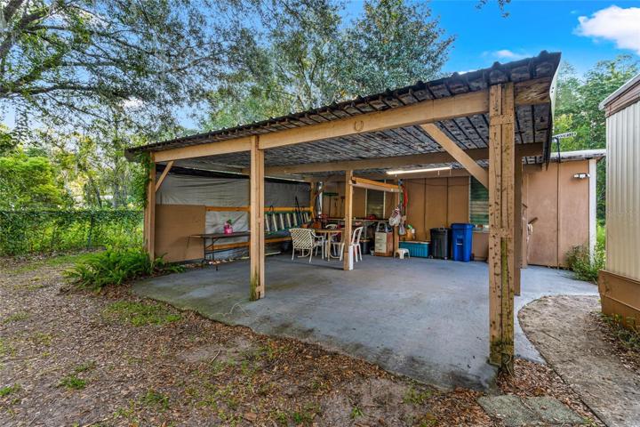 Double Carport w/attached shed