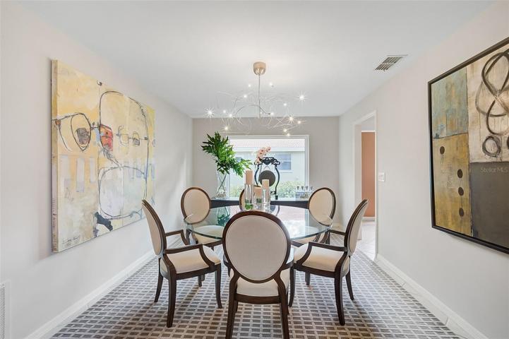Beautiful Dining Area, with a peek into the kitchen
