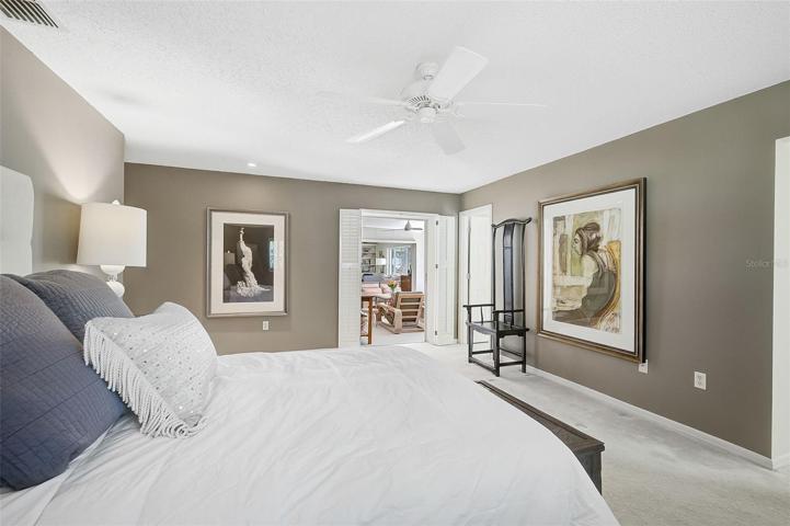 Master Bedroom, peeking out the sliding doors to the covered lanai area