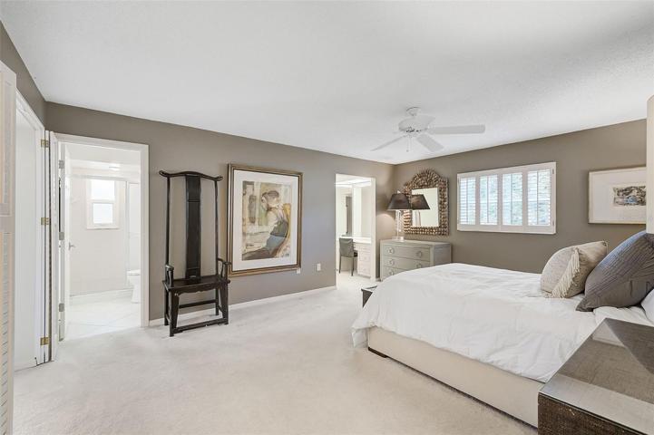 Master Bedroom, peeking into both full bathrooms, the one on the left is also the pool bath.