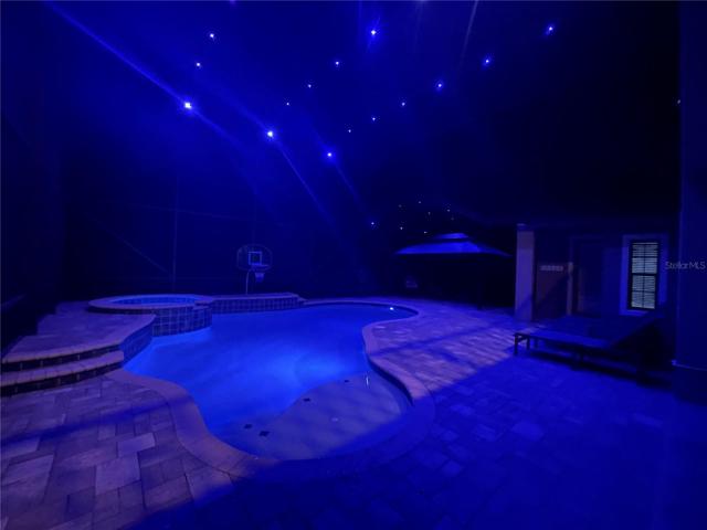 NEBULA LIGHTS illuminate the patio at night