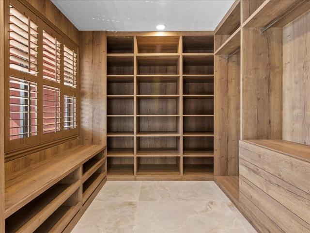 OWNER'S SUITE - CUSTOM CLOSET.