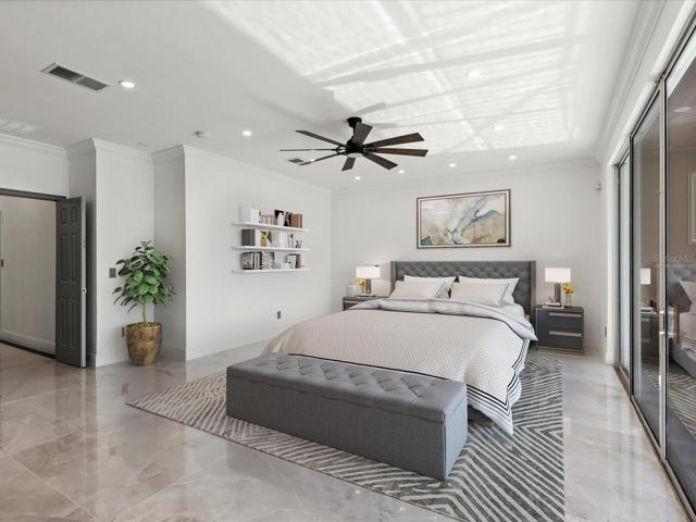 The crown molding, wood accent wall and stylish ceiling fan add a warm ambiance while the CUSTOM CLOSET and SPA-LIKE EN-SUITE bath make day to day living a breeze! Virtually Staged.